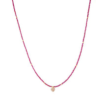 Ruby beaded necklace with diamond-encrusted heart