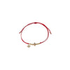 Red string bracelet featuring crisscross charm