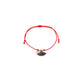 Red string bracelet with solitary silver God eye